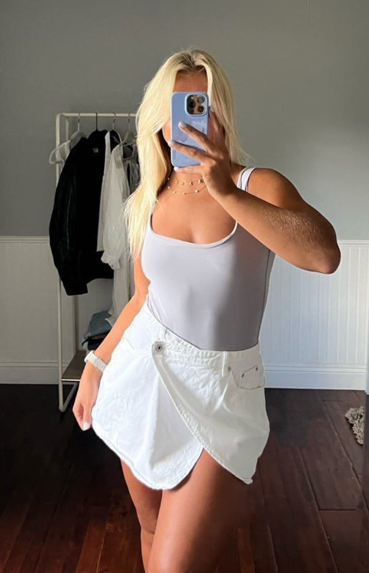 Alcmene White Denim Asymmetrical Wrap Mini Skirt
